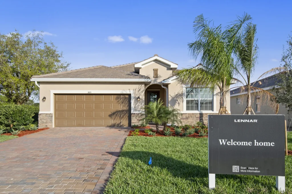 Marsala model home by Lennar at River Hall with three-car garage elevation