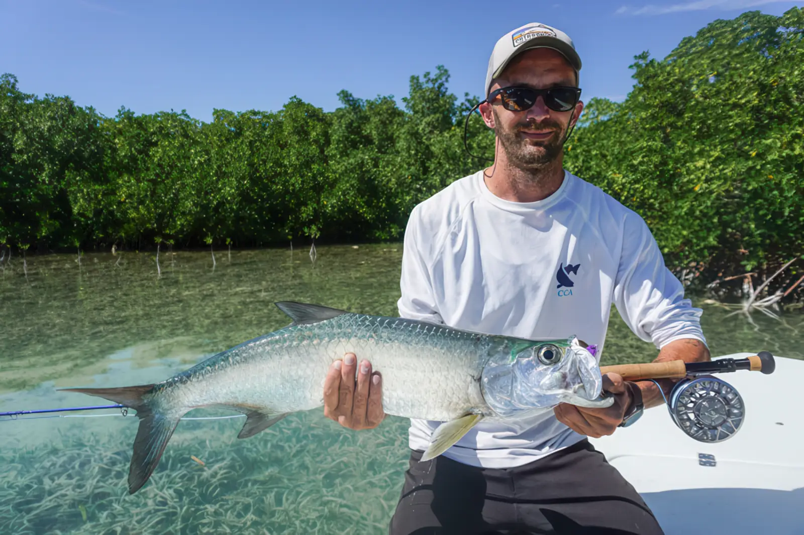 Angler casting into calm backwater near Alva Florida
