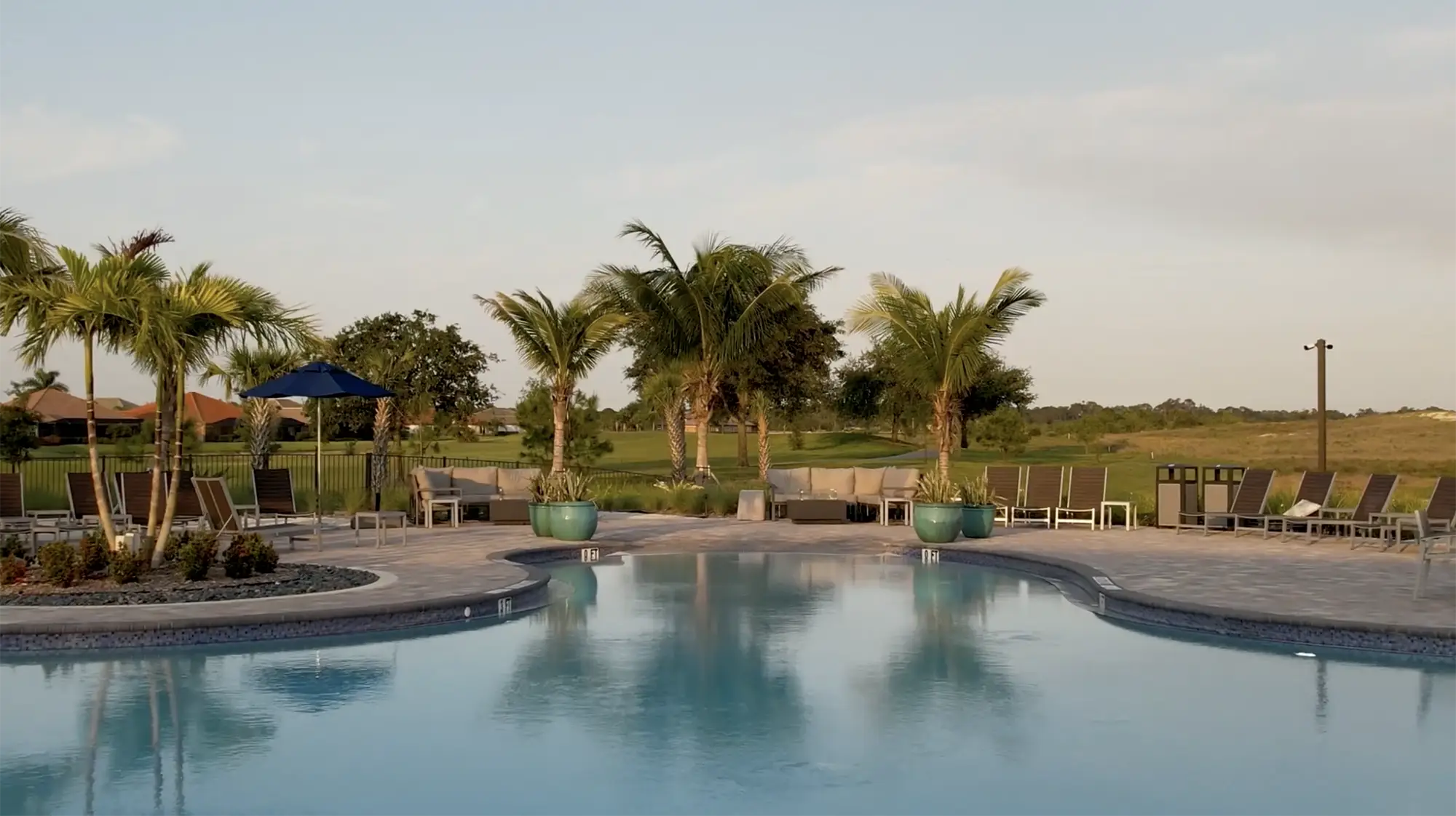 The resort pool and sun deck at River Hall and Hampton Lakes in Alva, Florida