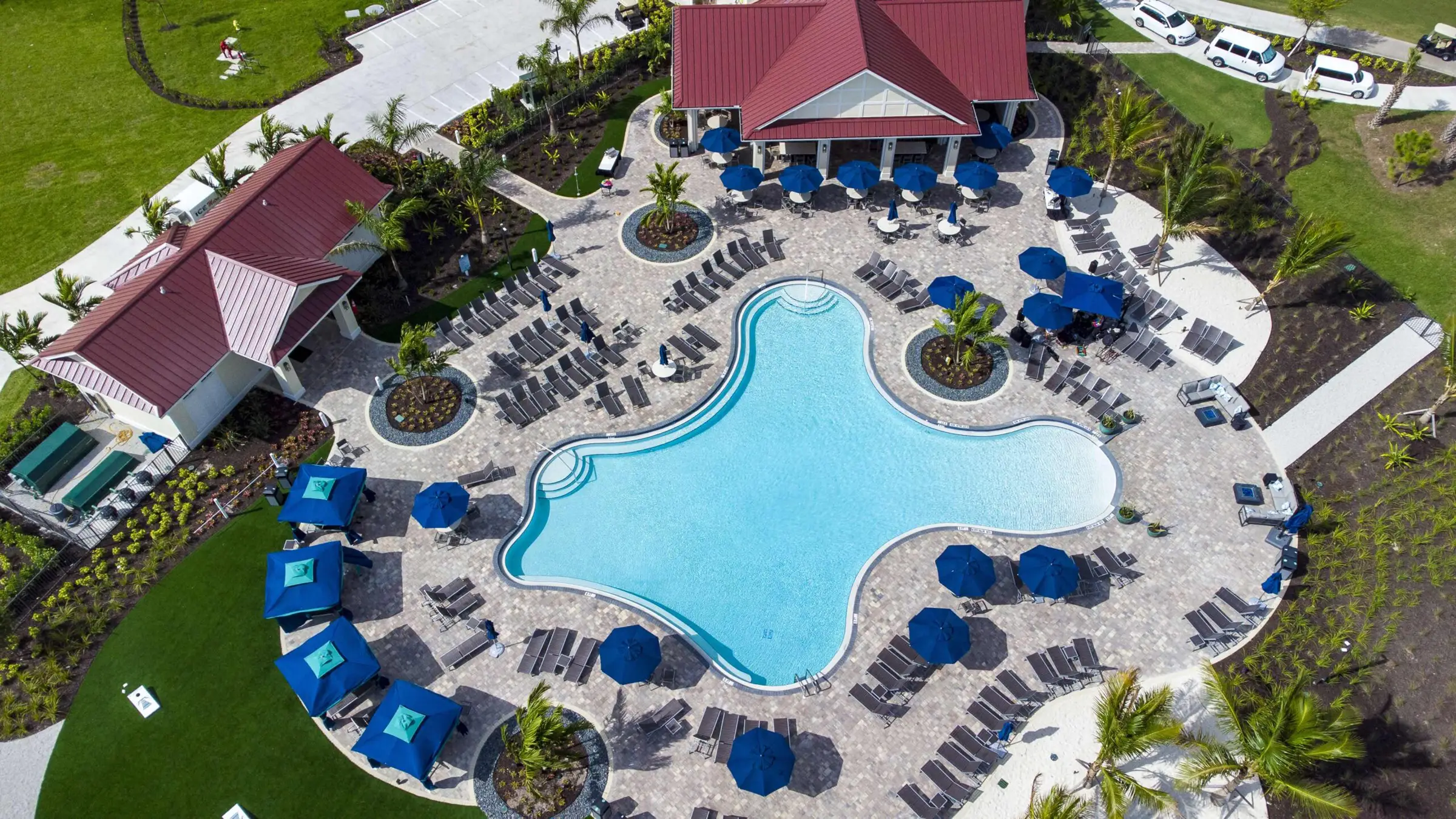 Aerial of the lakeside members pool and Bunker Bar at River Hall Country Club
