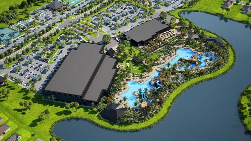 Artist rendering of the Kingston amenity campus in Estero, Florida, with clubhouse buildings and a resort-style pool beside a lake